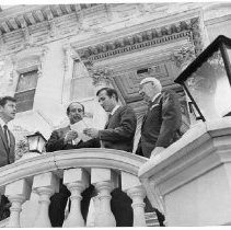 View of front of Stanford Home with Edwin L. Z'berg, James Keating, John Dowdell and Harold Norton on stairs