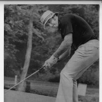 Bob Lunn, pro golfer, grimaces as he misses a birdie putt