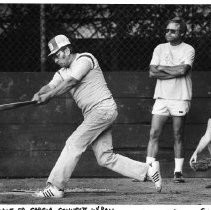 Edward J. Garcia. Municipal Court Judge Edward J. Garcia playing baseball. Umpire and catcher not identified