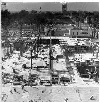 Elevated view of the United States Federal Building under construction at Capitol Ave and N Streets. View is looking west toward the Tower Bridge