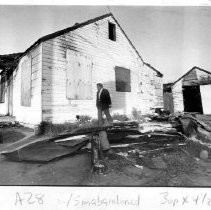 Grantland Johnson inspects an empty, dilapidated building in Del Paso Heights