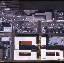 Views of redevelopment sites, renderings, and table models for the proposed Redevelopment District. Includes maps and site plans. This view shows a table model