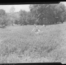 Suzette O'Gormon sitting in a field of lupins