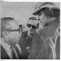 President of San Francisco SU, Dr. S.I. Hayakawa, left, faces up to a militant student just after tearing the wiring loose from sound truck speakers after the vehicle had been driven on campus against his orders