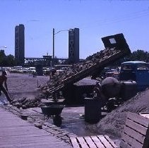 Old Sacramento historic district. View of cobblestones being added to the streets in the district