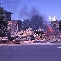 Views of redevelopment sites showing the demolition of buildings in the district. These views date from 1959 to 1964. Specific sites are not identified in this set of images