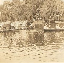 Children on Decorated Canoes