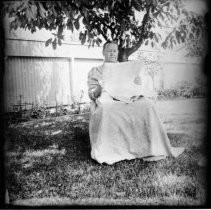 Woman Reading Newspaper