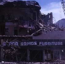 Views of redevelopment sites showing the demolition of buildings in the district. These views date from 1959 to 1964. This view is of the Golden Eagle Hotel being demolished