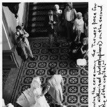 Newlyweds Christina Jonas and Larry Turner pose for pictures on the second floor landing of the California State Capitol building in a setting they won't forget