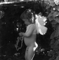 View of a child in a cupid costume