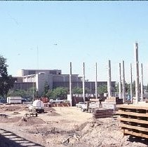 Site of the Downtown Plaza Parking Garage, Lot "G" near Macy's Department Store, 4th, 5th K and L Streets under construction. This view is looking east from the Fratt Building in Old Sacramento