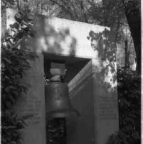 A monument consisting of a bell in a frame