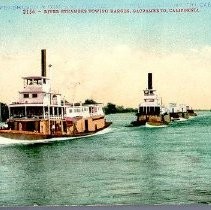 "River Steamers Towing Barges"