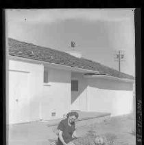 Two women sitting on a patio