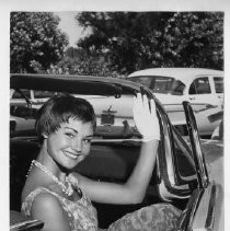 Linda Marie Hines, Miss Sacramento, in a car, waving