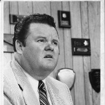 Duane Lowe at his office desk