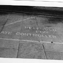 Exterior view of the California State Capitol grounds showing the reserved for the State Controller parking place