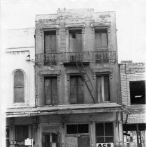 Photograph of Legget Building in Old Sacramento, prior to restoration