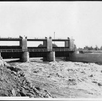 Gates to settling basin at Laguna Dam. . ."