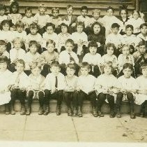 Class of Students Seated on Stairs