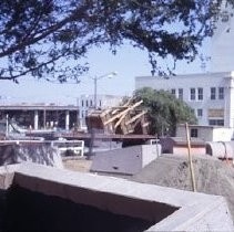 View of Macy's Department Store at K and L Streets between 5th and 6th Streets and construction of the Downtown Plaza surrounding the store