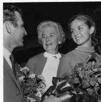 Eddi Duckworth, Miss Sacramento of 1967 shown on her return from Munich, Germany. Also shown, John Bassey Sacramento Junior Chamber of Commerce and Director of the Miss Sacramento Pageant Mrs. Gustav Scheidel