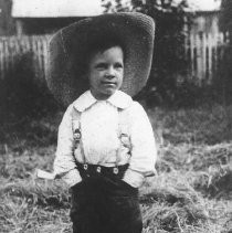 Boy Wearing Large Hat