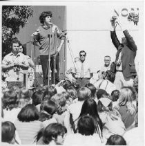 Tom Hayden (Thomas E. Hayden), antiwar and civil rights activist, at microphone