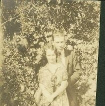 Lucile and Charles Haslam in Bushes