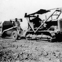 "Caterpillar Pulling LeTourneau Scraper"