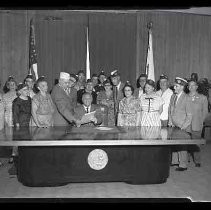 Veterans around a desk