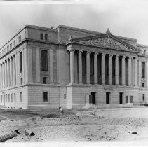 Exterior view of the State Library and Courts Building under construction showing it nearly completed by 1926