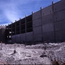 Site of the Downtown Plaza Parking Garage, Lot "G" near Macy's Department Store, 4th, 5th K and L Streets under construction. This view is looking east from the Fratt Building in Old Sacramento