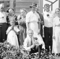 Unknown family on porch of home