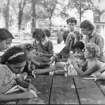 Girls Making Dolls