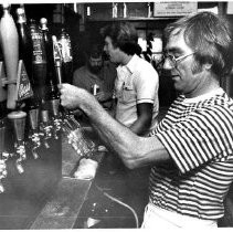 Bill Dalton drawing beer at the Fox & Goose Restaurant