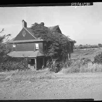 Farm house with farm equipment