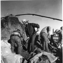 Making Sandbags for Levee
