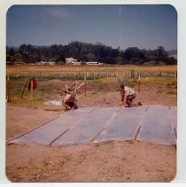 Photographs of Bolinas Bay. "Covering archaeological dig, Bolinas Lagoon, 8-21-74."