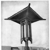 Crossroads Shopping Center with light standard in foreground