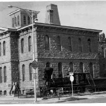 The former United States Mint in Carson City, Nevada is the state's historical museum. The Virginia and Truckee Railroad engine sits to the right