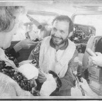 Dr. Alvin Marks, pilot and owner of Skymark Airlines. Here, with his wife Phoebe, being interviewed by reporters