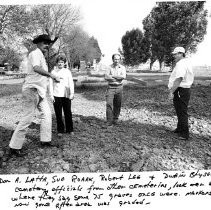 From the left: Don A Latta, Sue Roark, Robert F. Lee, and Dwain Blyseth, cemetery officials from other cemeteries look over area where they say some 75 graves once were