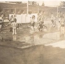 Children Splashing in Pool