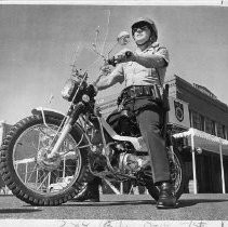 Officer Luther Lindbarger of the Sacramento Police Department on a motorcycle