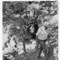 View of the Malakoff Diggings State Historic Park near North Bloomfield in Nevada County. Caption reads: North Bloomfield Drain Tunnel in Malakoff has been opened for guided tours