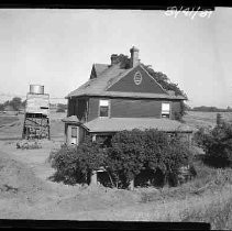 Farm house with farm equipment