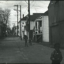 Views of redevelopment sites, renderings, and table models for the proposed Redevelopment District. Includes maps and site plans