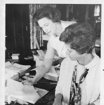 Alberta Jordan, widow of late Secy. of State Frank M. Jordan, runs for his office; she appears to be in her campaign office, with Mrs. Robert Law